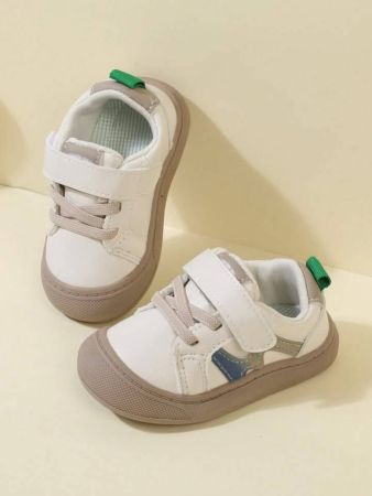 One pair of beige simple everyday sneakers for unisex kids