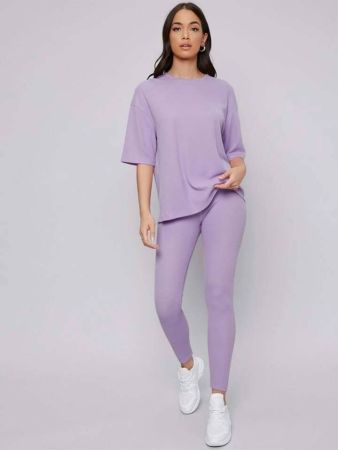 Uniform Color Low Shoulder Top and Leggings Set