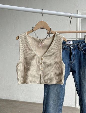 Elamini ملابس علوية محبوكة بدون أكمام ذات رقبة على شكل حرف V لون واحد متعددة الاستخدامات للنساء في الصيف