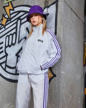 Streetz SHEIN Sport بدلة رياضية للنساء بقطعتين مناسبة للرياضة تحتوي على خطوط ملونة