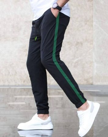 Manfinity Homme سروال رجالي طويل ذو خصر برباط وجوانب متباينة ولون موحد أسود، يصلح للخروجات